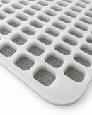 Angled view of 4mL brick gummy mold with 185 embossed cavities