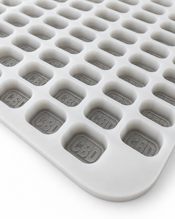 Angled view of 4mL brick gummy mold with 185 embossed cavities