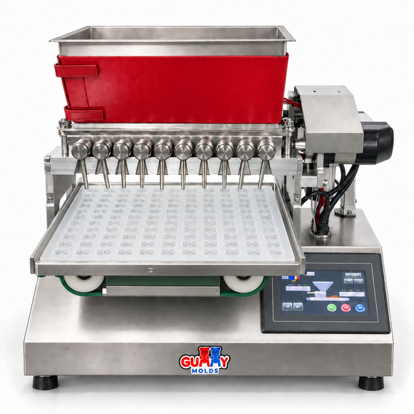 Angled view of Gummy Molds 10-nozzle commercial gummy depositor with red heated hopper and clear platinum-cure silicone mold